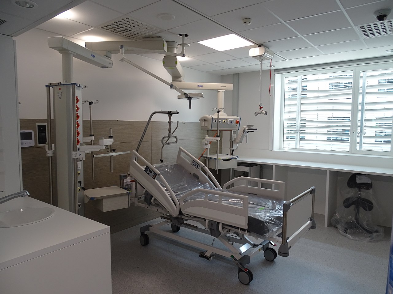 Modern ICU equipment and hospital beds